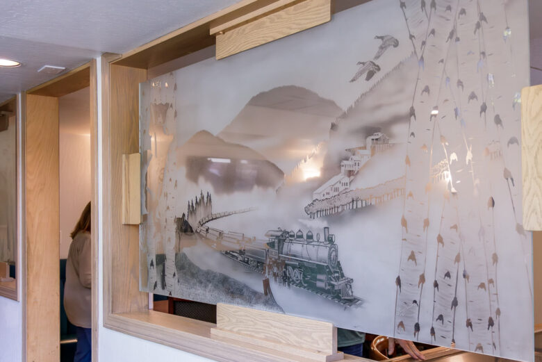 Outside view of a meeting room with a glass decorative window